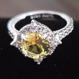 Radiant Silver Ring with Yellow Gemstone